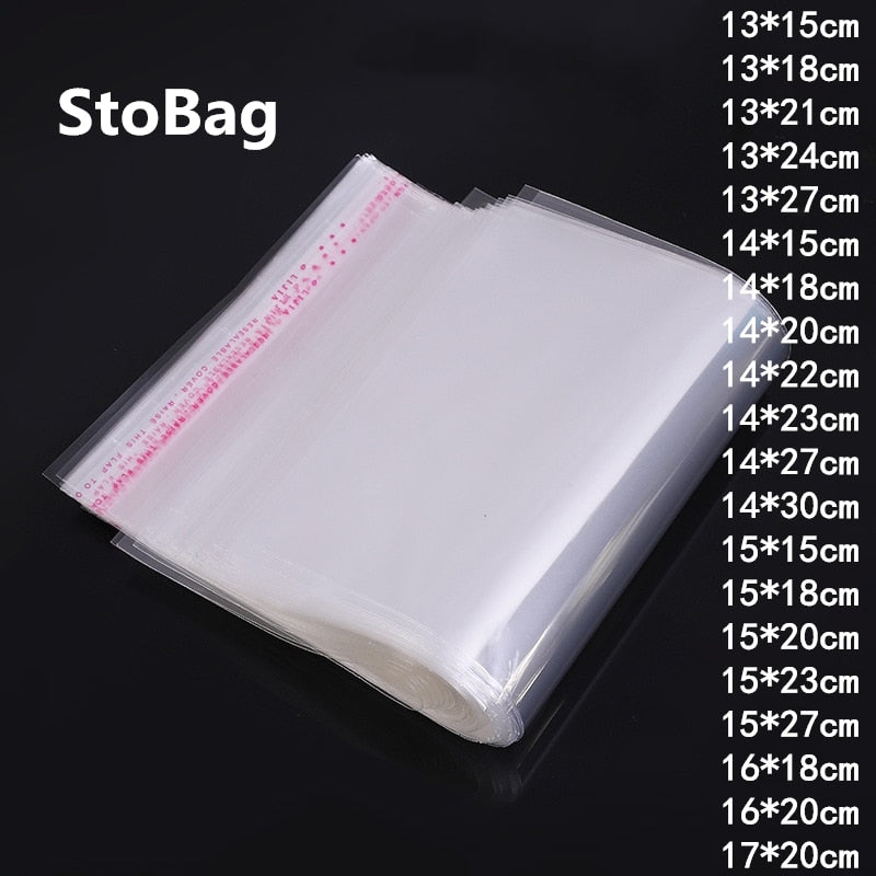 100pcs Clear Plastic Self Adhesive Bag Cloth Sock